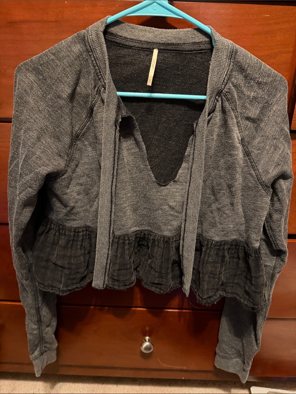 Free People dark gray/black Ruffled Hem Tie-Neck Pullover